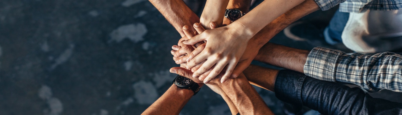 hands in a pile for teamwork